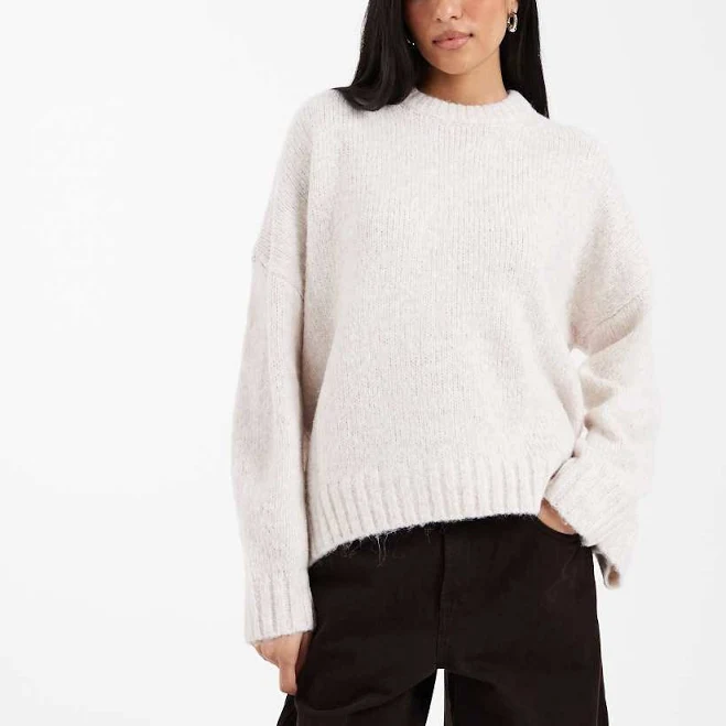 top ASOS Super Oversized Chunky Crew Neck Sweater with Curved Hem ASOS $29.99